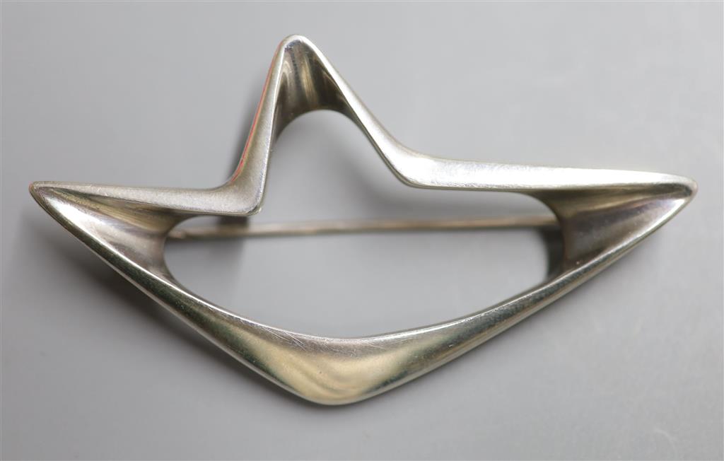 A Georg Jensen 925 openwork abstract brooch, designed by Henning Koppel, no. 376, 68mm, gross 17.4 grams.